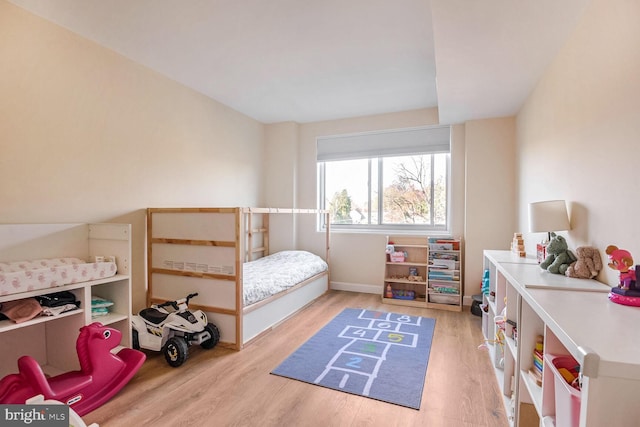 bedroom with light wood-type flooring