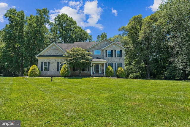 view of front of house with a front lawn