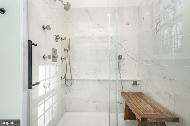 bathroom with tiled shower