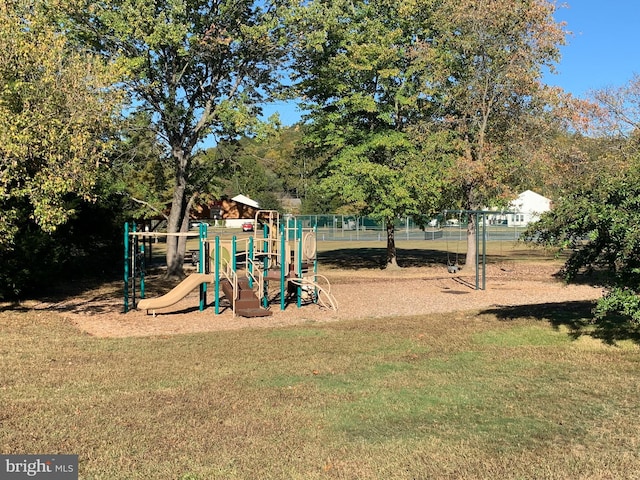 view of play area with a yard