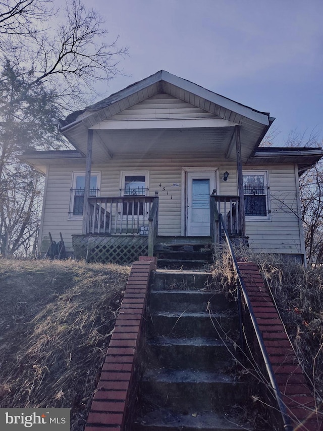 bungalow featuring covered porch