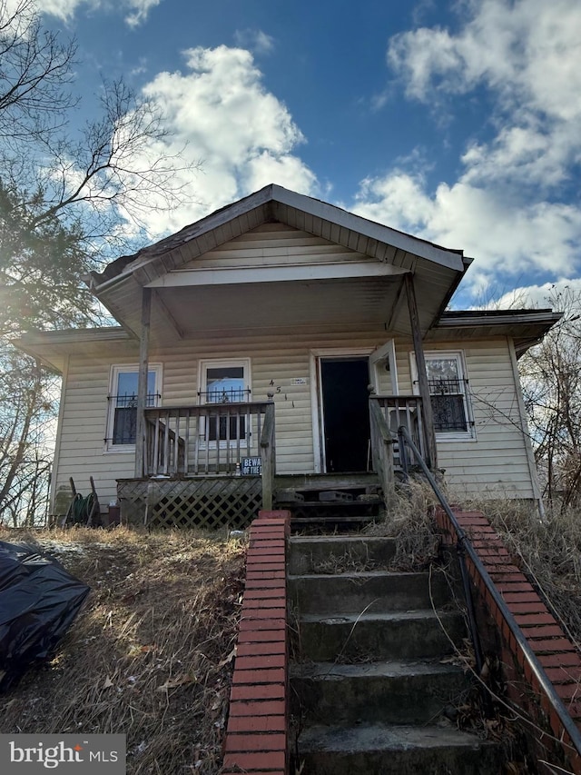 bungalow-style home with covered porch