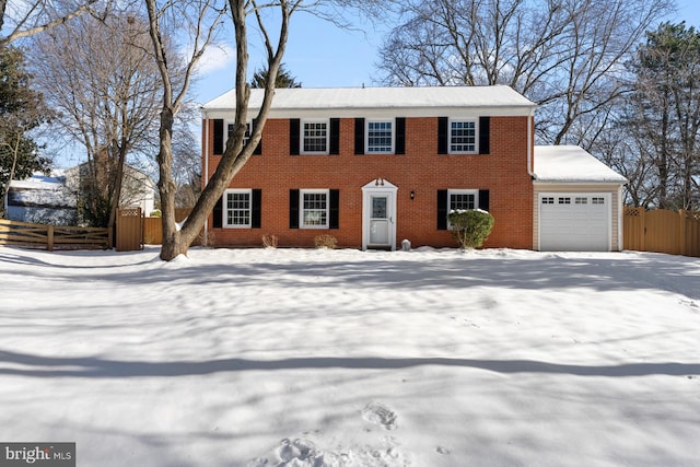 colonial home featuring a garage