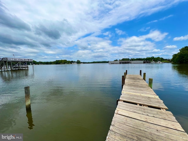 view of dock with a water view