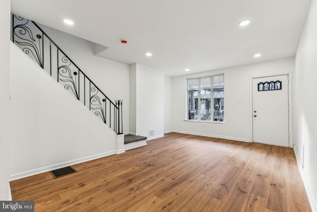 foyer featuring wood-type flooring