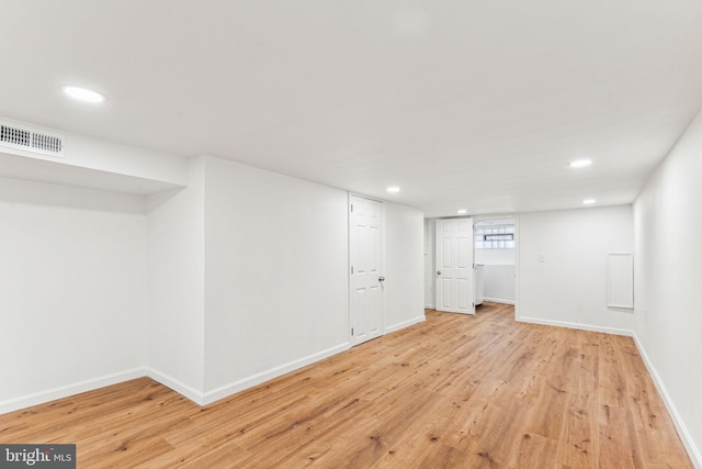 basement with light wood-type flooring