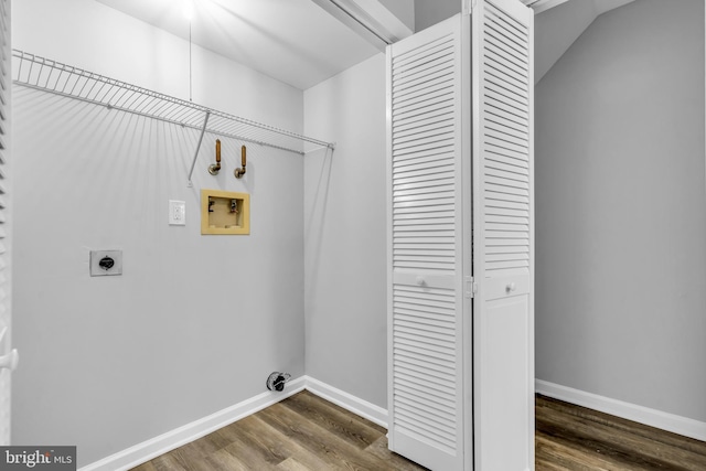 clothes washing area featuring dark wood-type flooring, washer hookup, and hookup for an electric dryer