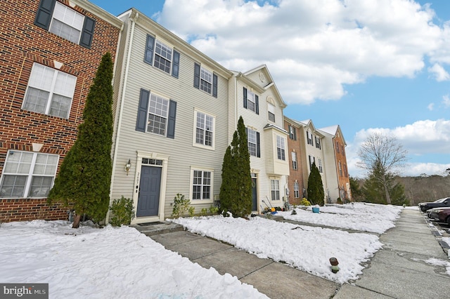 view of snow covered property