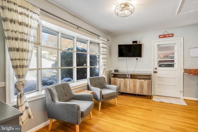 living area featuring hardwood / wood-style floors