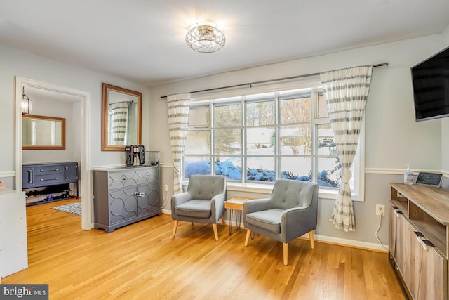 sitting room featuring light wood-type flooring