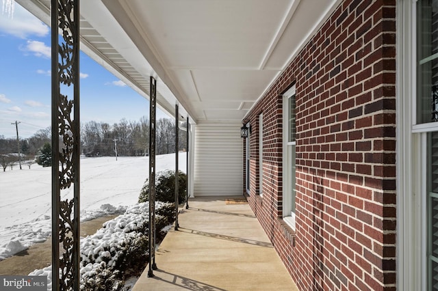 view of snow covered patio