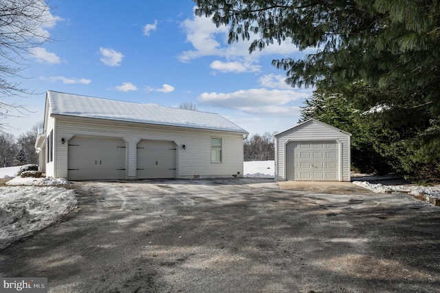 view of snow covered garage