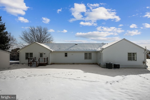 rear view of property featuring cooling unit