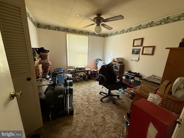 carpeted office with ceiling fan