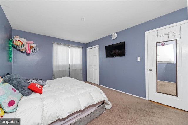 carpeted bedroom with a closet