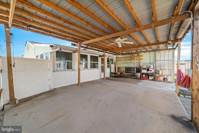 view of patio with an outbuilding