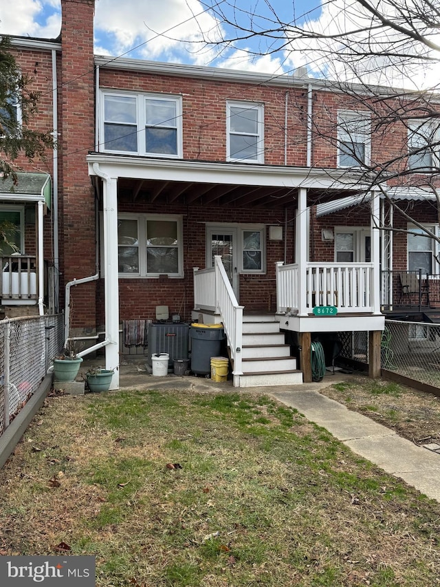 view of front of home with a front yard