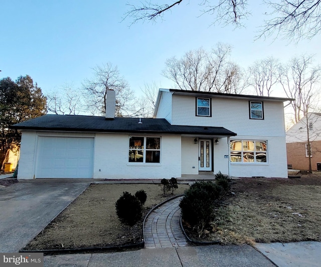 front of property featuring a garage