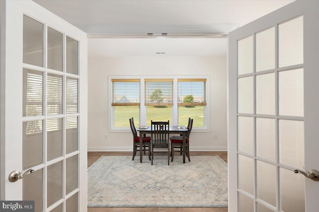 dining room featuring hardwood / wood-style flooring