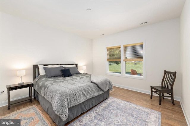 bedroom featuring hardwood / wood-style flooring