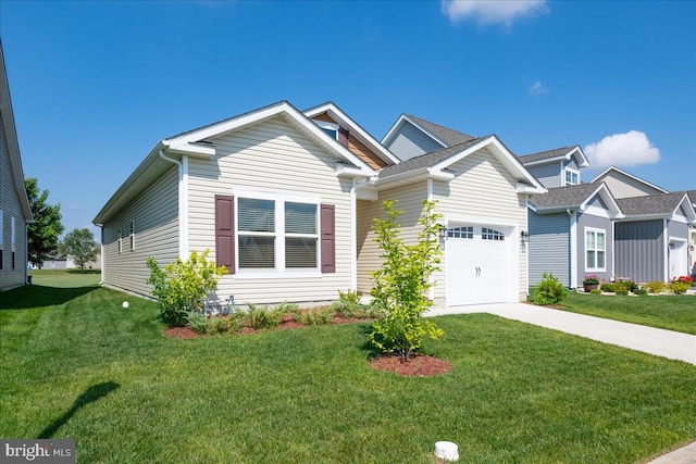 view of front of house featuring a front yard and a garage