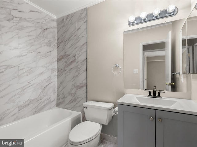 full bathroom featuring ornamental molding, vanity, tub / shower combination, and toilet