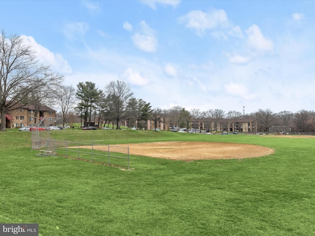 view of property's community featuring a lawn