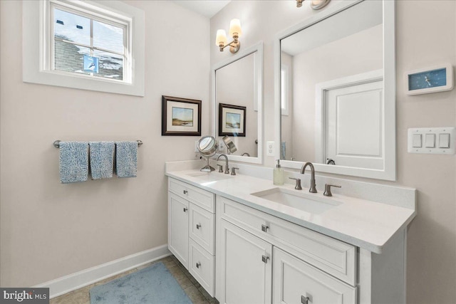 bathroom featuring tile patterned floors and vanity