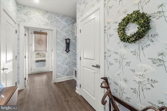 corridor featuring dark hardwood / wood-style floors