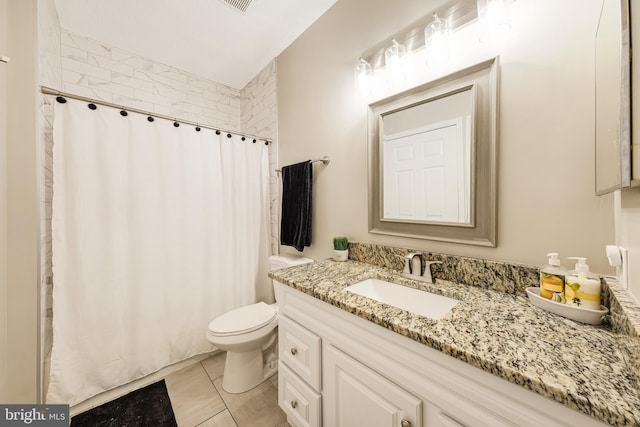 bathroom with tile patterned floors, vanity, toilet, and a shower with curtain