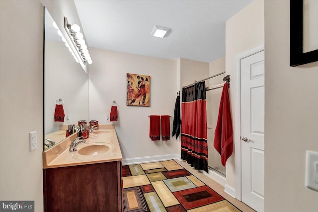 bathroom featuring vanity and a shower with curtain