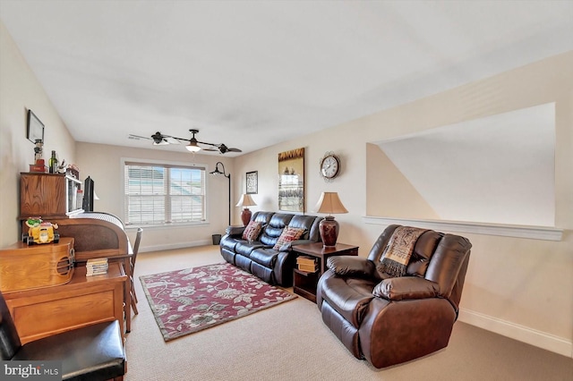 carpeted living room featuring ceiling fan