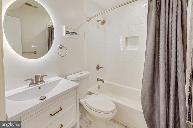 full bathroom featuring vanity, shower / bathtub combination with curtain, and toilet