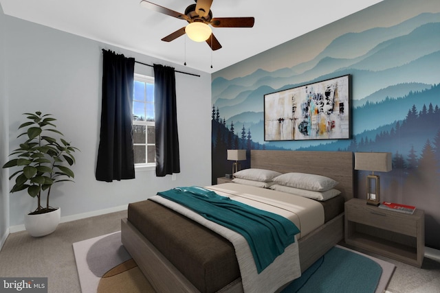 bedroom featuring ceiling fan and light colored carpet