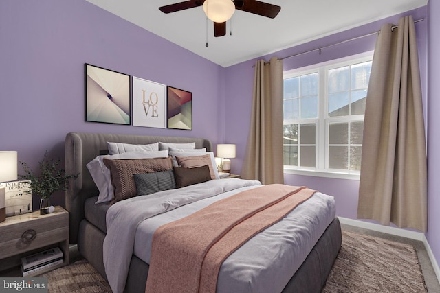 carpeted bedroom featuring ceiling fan