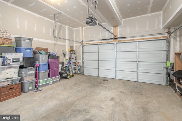 garage featuring a garage door opener