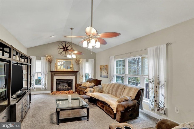 living room featuring light carpet, ceiling fan, and lofted ceiling