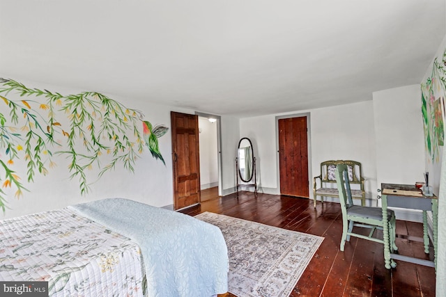 bedroom featuring dark wood-type flooring