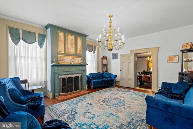 living room with a chandelier and hardwood / wood-style floors