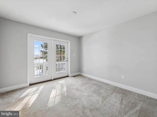 view of carpeted spare room