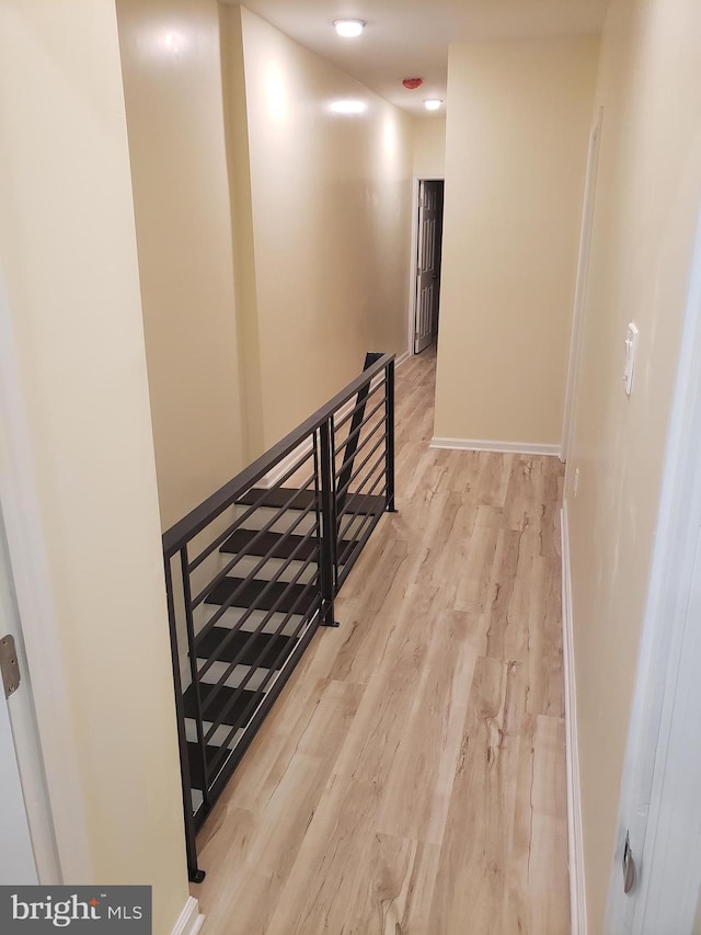 stairway with wood-type flooring