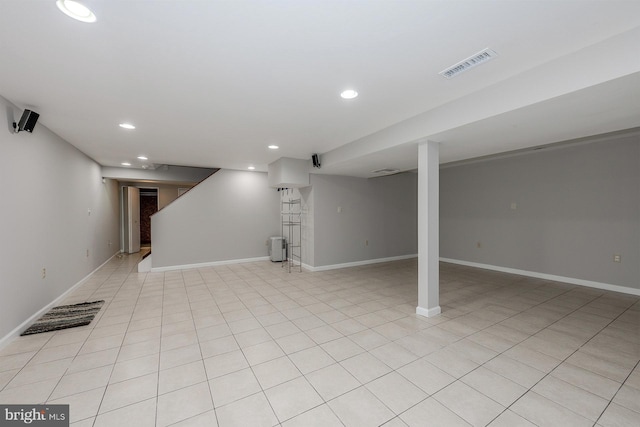 basement with light tile patterned floors