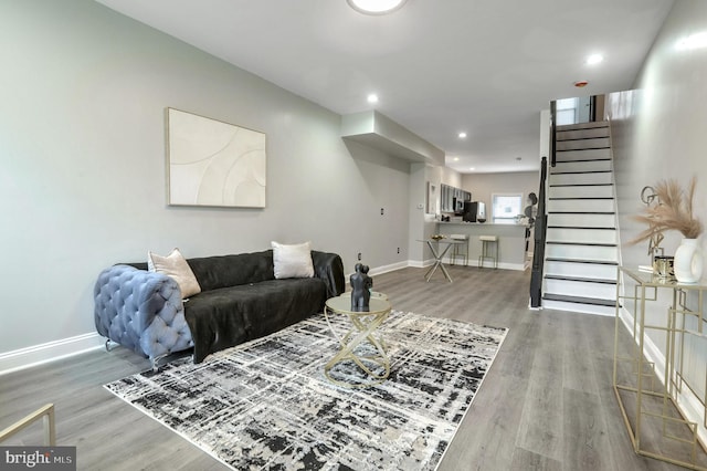 living room with hardwood / wood-style flooring