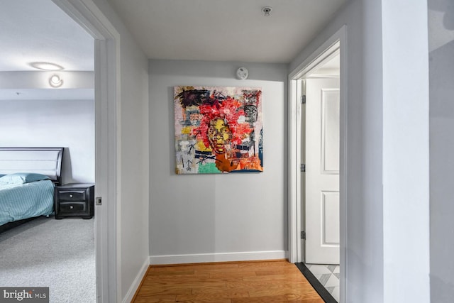 hallway featuring light hardwood / wood-style floors