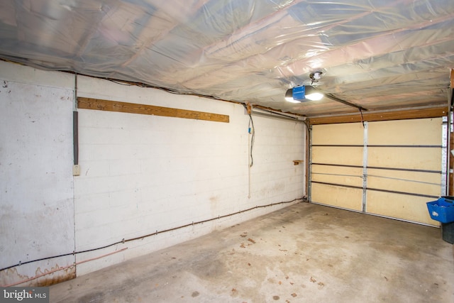 garage featuring a garage door opener