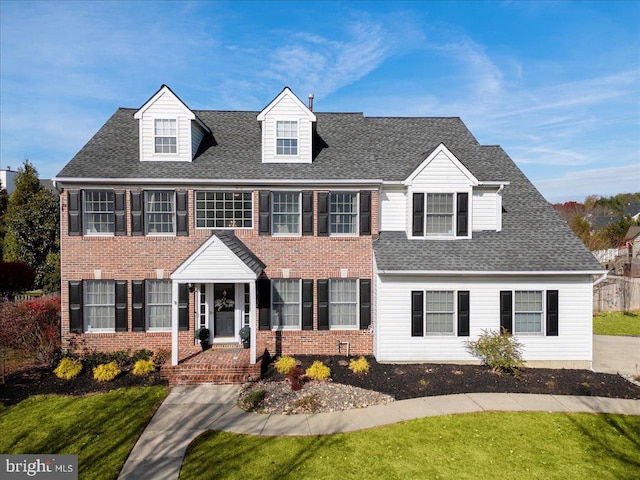 view of front of property with a front lawn