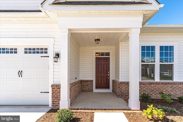 entrance to property with a garage