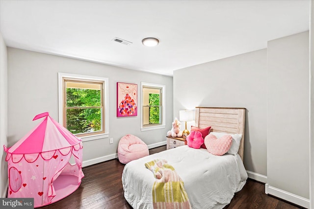 bedroom featuring dark wood-type flooring