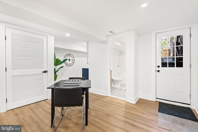 foyer entrance featuring light wood-type flooring