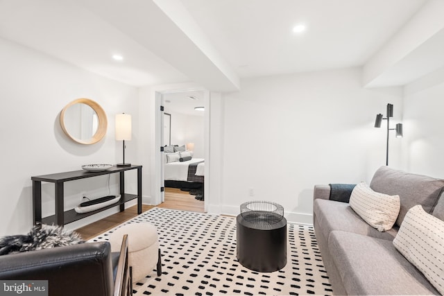 living room with light hardwood / wood-style flooring